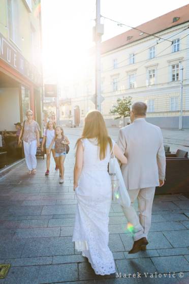 bride and groom in the city streets - natural