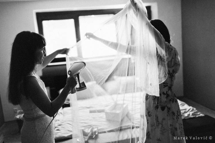 bride getting ready - ironing veil