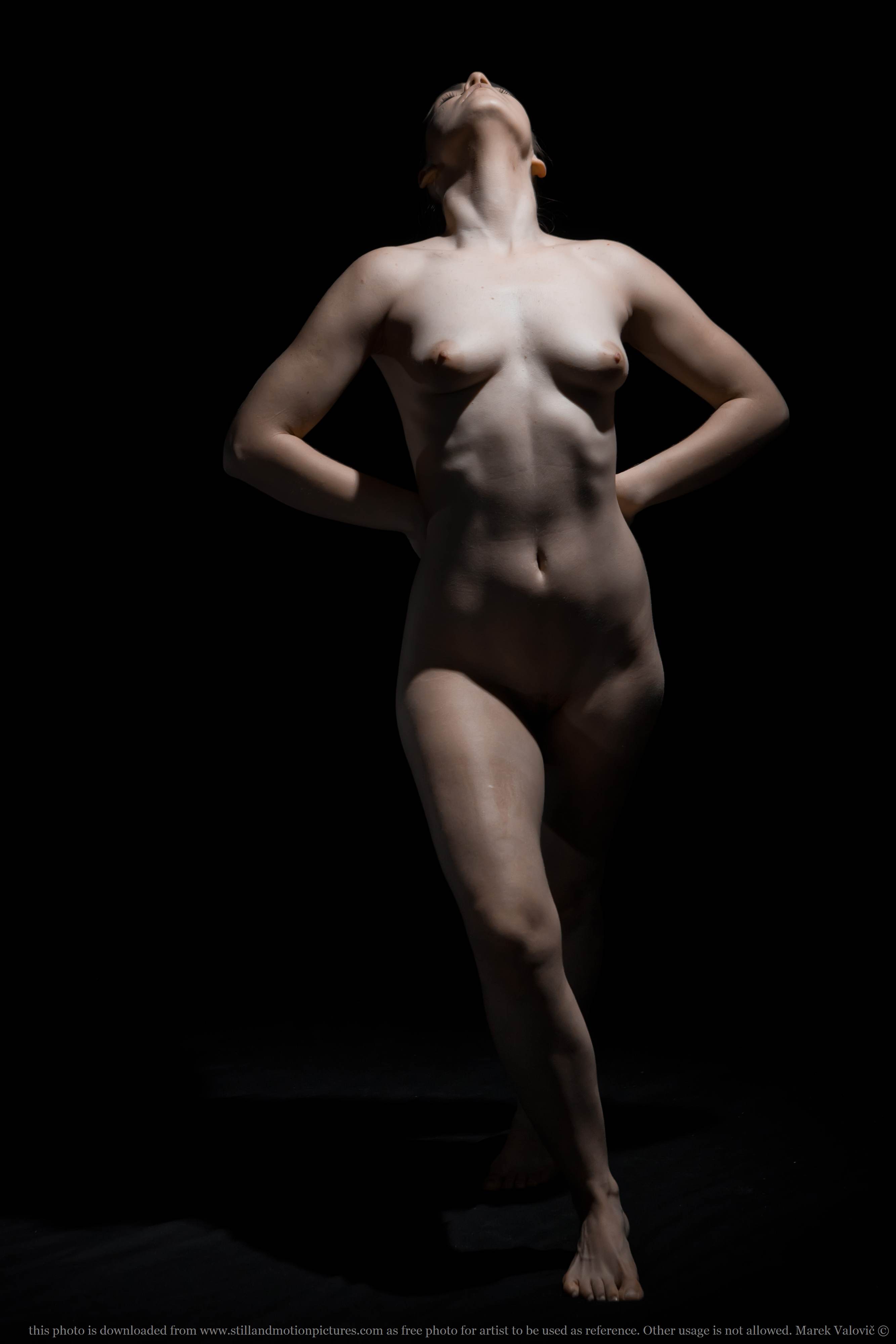 free nude woman pose for artist | figure looking up | black background