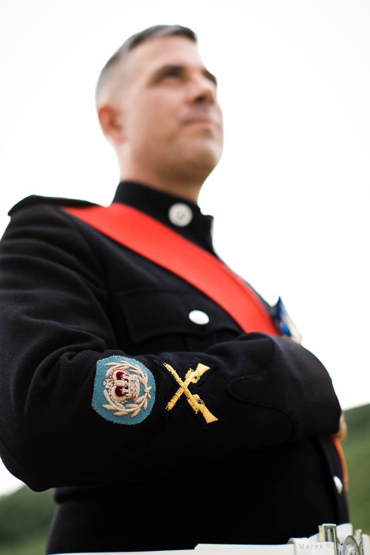 batches on black army uniform - groom