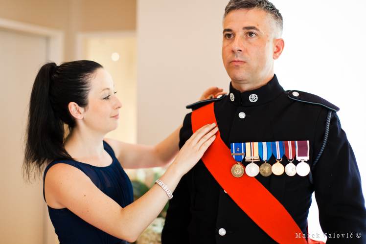 groom getting ready, black english soldier uniform