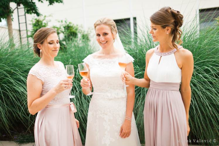 bride bridesmaids drinking
